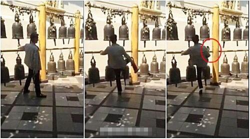 中国游客在泰国脚踢古寺铜钟遭讨伐(图)